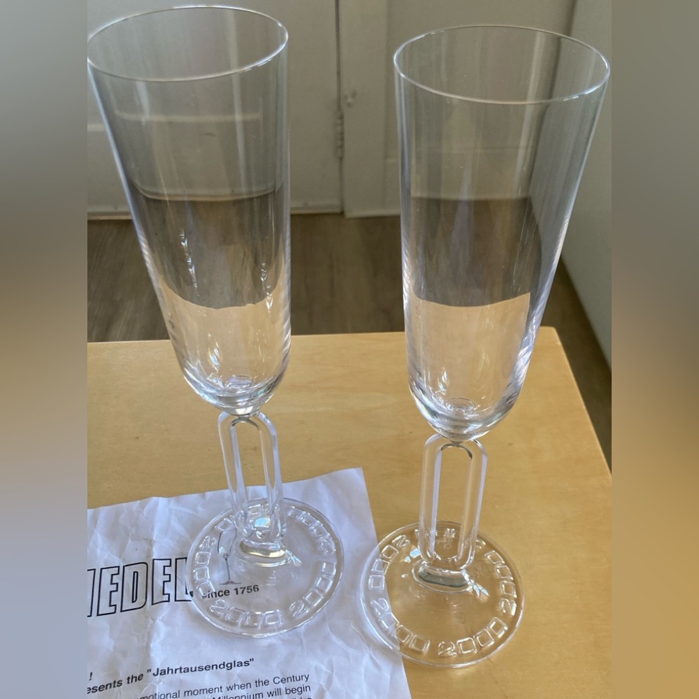 Collectible set of 2 Riedel millennium champagne flutes. Like new condition